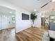 Open living space with modern finishes, seamlessly connecting the living room and kitchen at 609 Brockway Ave, Orlando, FL 32807