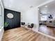 Cozy room with unique decorative wall and an open floor plan leads into the living room at 609 Brockway Ave, Orlando, FL 32807