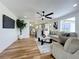 The open floor plan seamlessly connects the living area to the kitchen, ideal for entertaining at 609 Brockway Ave, Orlando, FL 32807