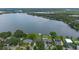 Lakeside community with lush trees and serene waters at 641 Virginia Dr, Winter Park, FL 32789
