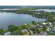 Lake houses with a lush green landscape provides peace and serenity at 641 Virginia Dr, Winter Park, FL 32789
