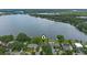 Lakefront homes with lush greenery and a large lake for a relaxing view at 641 Virginia Dr, Winter Park, FL 32789