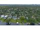 Aerial view of the property's location among other houses on the lake at 641 Virginia Dr, Winter Park, FL 32789
