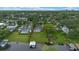 Aerial view showcases the vast property with a waterfront location and beautiful landscape at 641 Virginia Dr, Winter Park, FL 32789