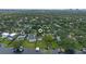 Aerial view showcases the home's location and expansive green surroundings at 641 Virginia Dr, Winter Park, FL 32789