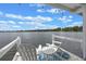 Charming deck with comfortable seating offers stunning lake views and a relaxing atmosphere at 641 Virginia Dr, Winter Park, FL 32789