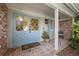 Charming front porch with double doors, brick accents, and a welcoming ambiance at 641 Virginia Dr, Winter Park, FL 32789