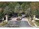 Aerial view of the community entrance with decorative palm trees at 6931 Sperone St, Orlando, FL 32819