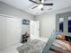 Functional bedroom features a bunk bed, TV, closet space, and neutral colors perfect for a  at 704 Forest View Ct, Winter Springs, FL 32708