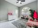 Bright bedroom with a big window, nice furnishings and décor at 704 Forest View Ct, Winter Springs, FL 32708
