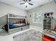 Bright ' room with bunk beds, a window, and plenty of space for activities and fun at 704 Forest View Ct, Winter Springs, FL 32708