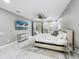 Main bedroom with a view of the pool and slider access to the outside sitting area at 704 Forest View Ct, Winter Springs, FL 32708