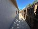 Side of house with brick pathway at 8258 Golden Chickasaw Cir, Orlando, FL 32825