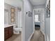 Bathroom featuring a vanity with ample storage and a shower with a white shower curtain at 8968 Hildreth Ave, Orlando, FL 32832