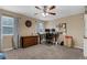 Spacious home office with dual monitors, neutral walls, and natural light at 9031 Stonebury Way, Orlando, FL 32832