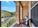 Inviting balcony with seating, perfect for relaxing and enjoying the neighborhood at 9997 Town Lake Dr, Orlando, FL 32832