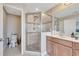 Bathroom featuring tile floors, a vanity, shower and commode at 9997 Town Lake Dr, Orlando, FL 32832