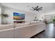 Spacious living room flows to dining, showcasing modern furnishings and finishes at 9997 Town Lake Dr, Orlando, FL 32832