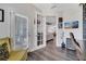 View from the office into a living area, emphasizing the open floor plan at 9997 Town Lake Dr, Orlando, FL 32832