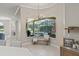 Cozy breakfast nook features large bay window overlooking screened in pool and lanai area at 10254 Hart Branch Cir, Orlando, FL 32832