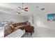 Spacious living room with vaulted ceiling, comfortable seating, dining area, and access to the outdoors at 10254 Hart Branch Cir, Orlando, FL 32832