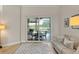 Living room view to outdoor dining area, visible through sliding glass doors at 10254 Hart Branch Cir, Orlando, FL 32832