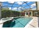 The private pool features a jacuzzi and offers a refreshing escape, complemented by lush greenery and serene surroundings at 10254 Hart Branch Cir, Orlando, FL 32832