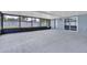 A screened patio with concrete floor and access door to the fenced backyard at 1031 Seneca Trl, St Cloud, FL 34772