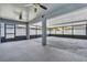 Spacious screened patio featuring lighting and ceiling fans for comfort at 1031 Seneca Trl, St Cloud, FL 34772