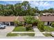 Aerial view of a charming single-story home featuring a well-manicured front yard and mature landscaping at 1032 Calanda Ave # 1032, Orlando, FL 32807