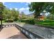Exterior of backyard showcasing boat dock, pool, and lush landscaping, ideal for outdoor enjoyment at 10915 Emerald Chase Dr, Orlando, FL 32836
