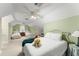 Spacious bedroom featuring neutral colors, plush carpeting, and plenty of natural light at 10915 Emerald Chase Dr, Orlando, FL 32836