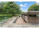 Exterior view of the covered boat dock showcasing a charming waterfront lifestyle with an easy access point at 10915 Emerald Chase Dr, Orlando, FL 32836
