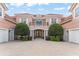 Elegant home with a tile roof, a paved driveway, and mature landscaping, perfect for luxury living at 10915 Emerald Chase Dr, Orlando, FL 32836