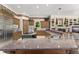 Large kitchen with stainless steel appliances, granite counters, and ample counter space at 10915 Emerald Chase Dr, Orlando, FL 32836