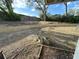 Backyard with a new retaining wall and some plants at 1140 Odoniel S Loop, Lakeland, FL 33809