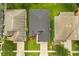 Aerial view of the house showing the roof and surrounding yards at 13658 Hidden Forest Cir, Orlando, FL 32828