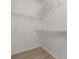 Walk-in closet with wire shelving at 13658 Hidden Forest Cir, Orlando, FL 32828