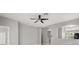 Open living room with wood style flooring and ceiling fan at 13658 Hidden Forest Cir, Orlando, FL 32828
