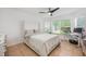Bedroom featuring neutral walls, tiled floor, and natural light at 14301 Bending Branch Ct, Orlando, FL 32824
