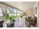 Spacious enclosed patio with tile flooring and abundant natural light at 14301 Bending Branch Ct, Orlando, FL 32824