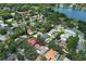 Aerial view of a residential neighborhood near a lake, showcasing homes with pools and mature trees, highlighted by a location pin at 1481 Glastonberry Rd, Maitland, FL 32751