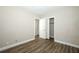 Bedroom with wood-style laminate flooring and walk-in closet at 1481 Glastonberry Rd, Maitland, FL 32751