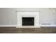 Close-up of the fireplace with white trim at 1481 Glastonberry Rd, Maitland, FL 32751