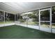 Spacious covered patio featuring green turf, with a view of the backyard at 1481 Glastonberry Rd, Maitland, FL 32751
