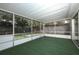 Back view of the house and its large, covered, screened-in patio at 1481 Glastonberry Rd, Maitland, FL 32751