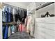 Organized walk-in closet with shelving and hanging space at 1769 Turnberry Ter, Orlando, FL 32804