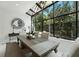 Bright dining room with a large window and seating for six at 1769 Turnberry Ter, Orlando, FL 32804