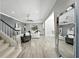 Open-concept living room with lots of natural light and hardwood floors at 1769 Turnberry Ter, Orlando, FL 32804