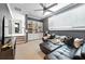 Cozy living area featuring built-in shelving and comfortable leather seating at 1769 Turnberry Ter, Orlando, FL 32804